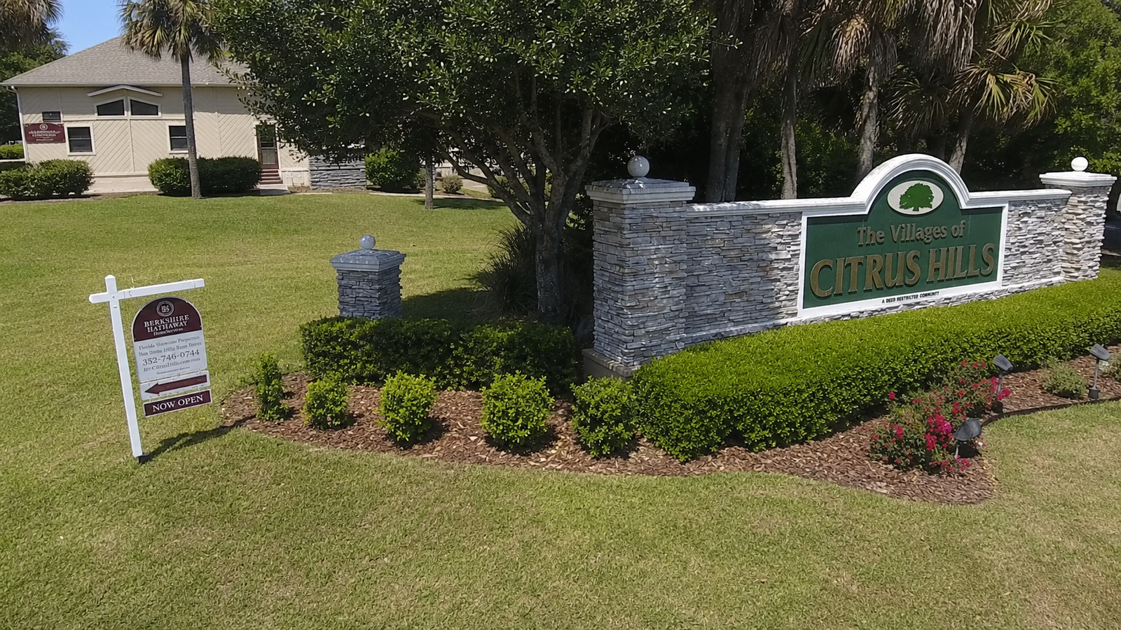 The Citrus Hills Home Team office, directly behind the Villages of Citrus Hills entrance sign at the main gate